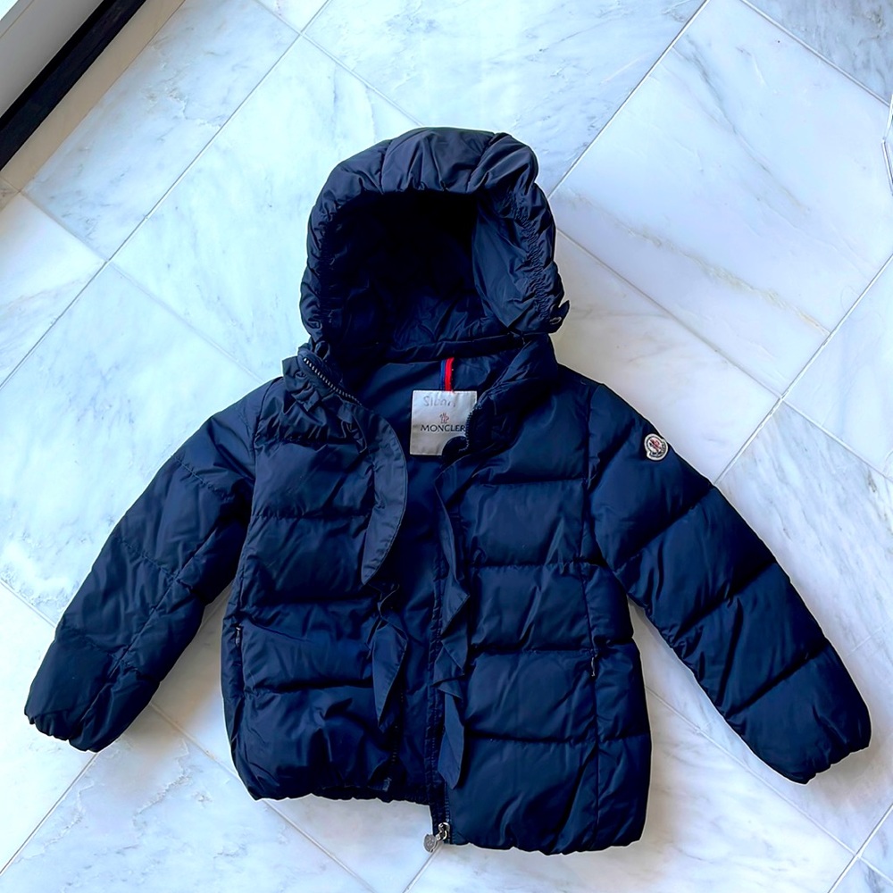 Moncler navy blue kids puffer coat.
